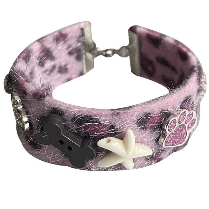 Discover the Charm of the Purple Leopard Print Paw Heart Bracelet